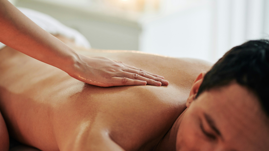 Man getting his back massaged